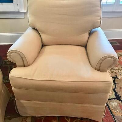 Beige linen upholstered swivel rocker $399
2 available