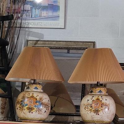Twin lamps with shades.