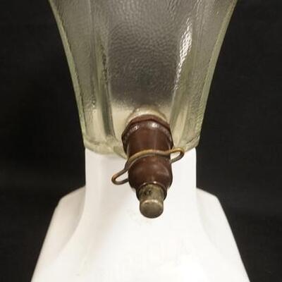 1297	GRAPE-OLA GLASS DISPENSER, BASE HAS A CRACK ON ONE SIDE, NO LID, 10 3/4 IN HIGH
