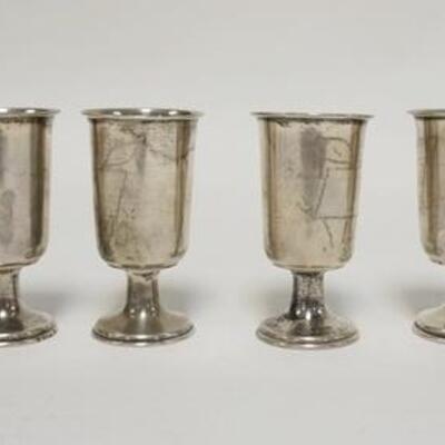 1041	6 STERLING SILVER CORDIALS, ONE HAS A DENT, 2 1/2 IN HIGH, 2.375 TOZ
