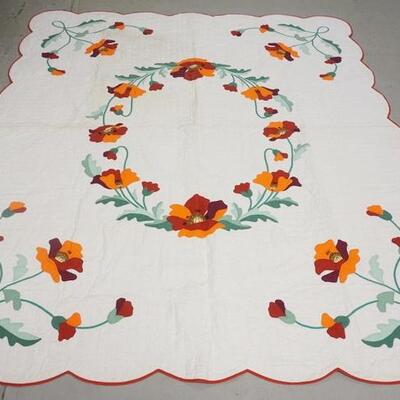 1258	HAND SEWN POPPY PATTERN QUILT, HAS SOME LIGHT STAINING. 74 IN X 86 IN 
