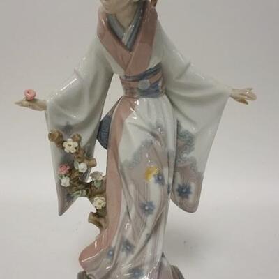 1283	LLADRO FIGURE ASIAN WOMAN HOLDING FLOWER, 10 3/4 IN H 

