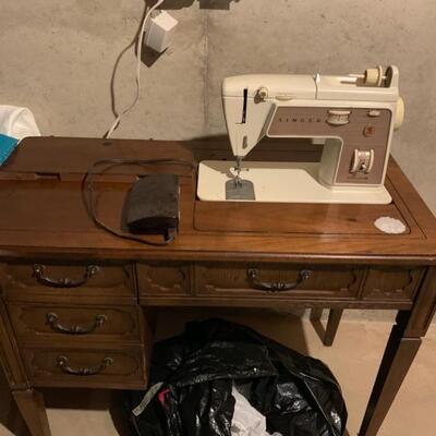vintage Singer sewing machine in oak case