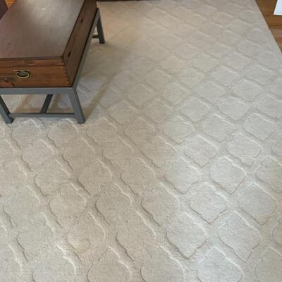 white wool rug with sculpted fretwork pattern, 9x12, has a matching 6x9 rug