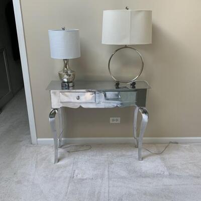 Aluminum console table and modern lamps