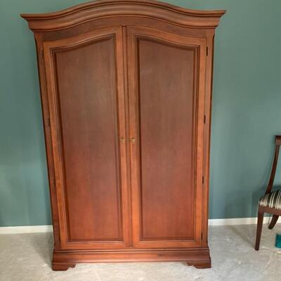 armoire with shelves and drawers, can be used an entertainment center or storage