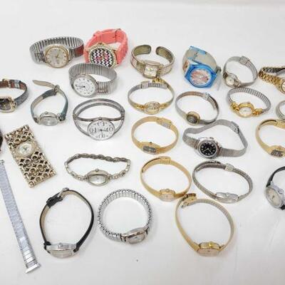 #308 â€¢ Approx 26 Wrist Watches And A Watch Band
