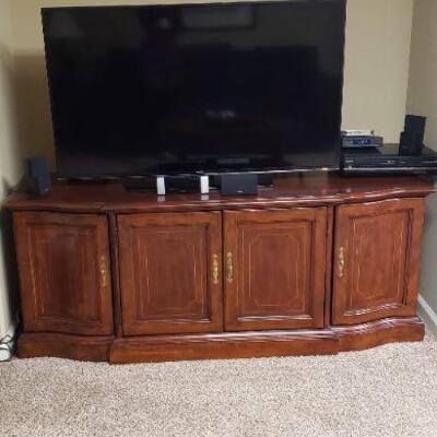 TV and Speakers are sold but Wood Cabinet is still available