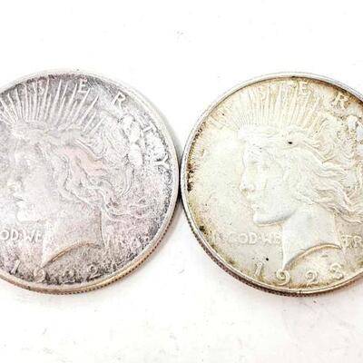 1731	

2 1922 And 1923 Silver Peace Dollars
Both San Francisco Mint