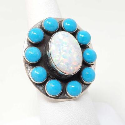 1420	

Native American Opal and Turquoise Cluster Sterling Silver Ring
Beautiful Opal surrounded by Genuine Turquoise 
Engraved around...
