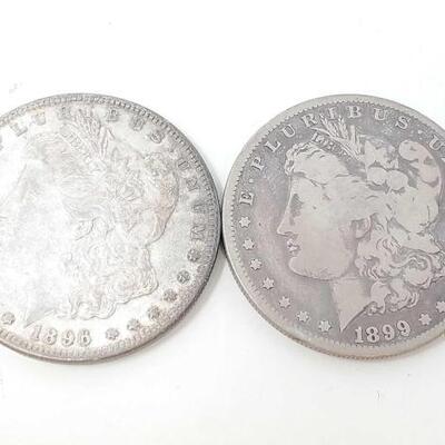 1716	

2 1896-P And 1899-O Morgan Silver Dollars
1896-Philadelphia Mint And 1899- New Orleans Mint Morgan Silver Dollars