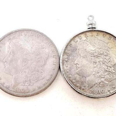 1715	

2 1900 Morgan Silver Dollars With Pendant Accessory
Both Mint Marks are Philadelphia 