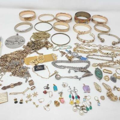 1672	

Costume Jewelry
Includes Earrings, Bracelets, Pins, Pendants And More!