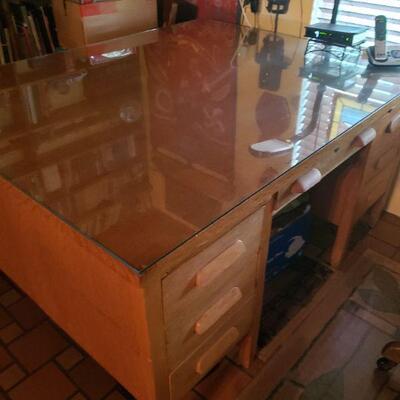 This is whats called a partners desk. What you see on the one side of the desk, is the same on the other side. Very good condition, has a...