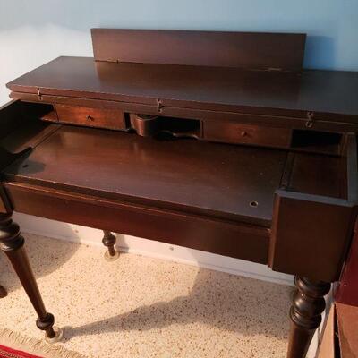 This is a very old Piano table, in very good condition for the age