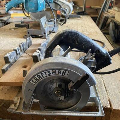 circular saw with miter saw in the background