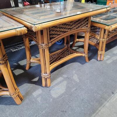 Brown wicker tables with glass tops