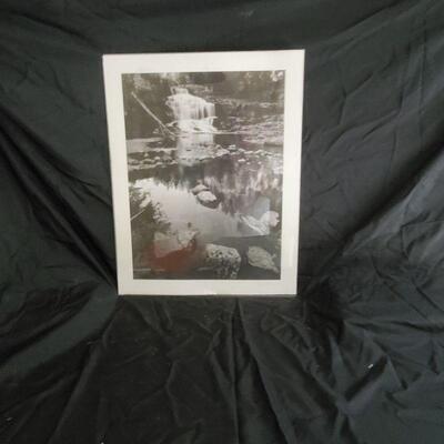 Woody Paterson and American Photographer who captured this Waterfall early in the 20th Centure 