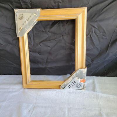 ;wood frame 14 inches by eleven inches