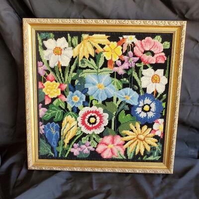 Seems like a malticulas  executed needlepoint floral design