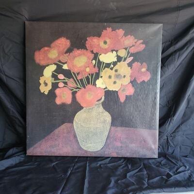 Large wall length flower arrangement potted in Vase. 