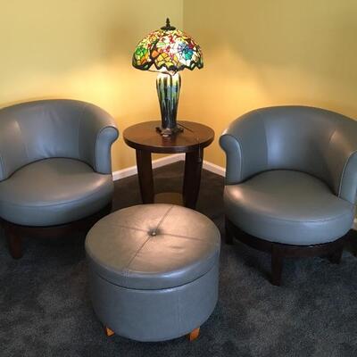 Gray Leather Swiveling Club Chairs (2 available), 29â€ D x 28â€ W