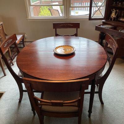 Round Dining Set with an additional leaf. 