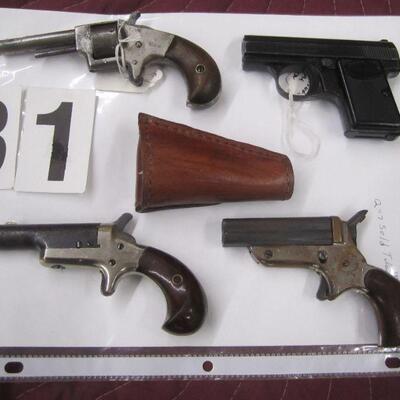 4 small hand guns