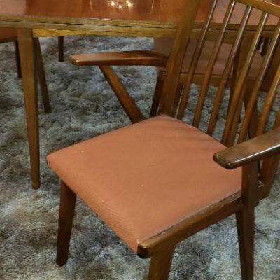 Hanseatic Furniture Company Made in Germany Dining Room table and 6 chairs.  2 Slide out leaves to double the table size.