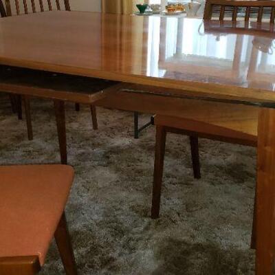 Hanseatic Furniture Company Made in Germany Dining Room table and 6 chairs.  2 Slide out leaves to double the table size.