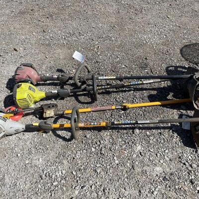 #81052 â€¢ One Ryobi Pole Saw, Two Ryobi Weed Whackers, One Toro Weed Whacker And Two Rolls Of Trimmer Wire