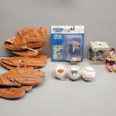 #5580 â€¢ Ozzie Gullien 1996 Edition Collectible, 2 Star Baseballs, 1 official Leauge Signed Baseball, Elvos Pres...