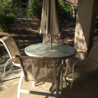 Patio table, 4 chairs and umbrella $75