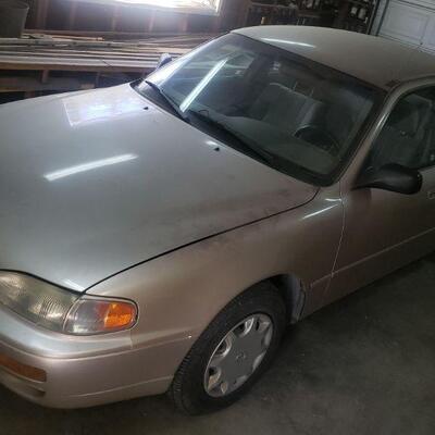 1995 Toyota Camry runs great with 250k miles. 