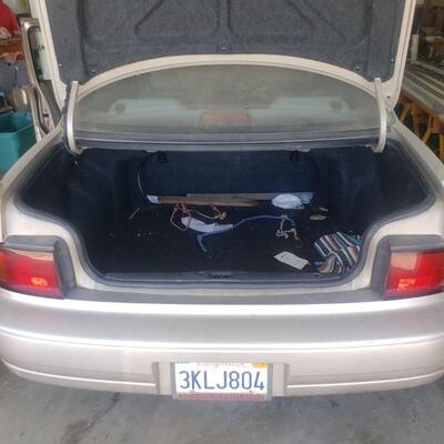 1995 Toyota Camry runs great with 250k miles. 