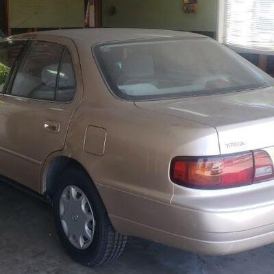 1995 Toyota Camry runs great with 250k miles. 