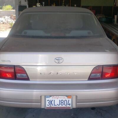 1995 Toyota Camry runs great with 250k miles. 