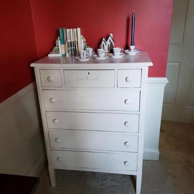 white painted chest of (7) drawers  top center has key $150.00