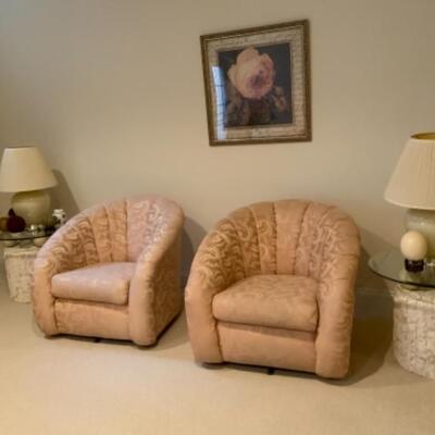 Pair of rounded accent swivel chairs 