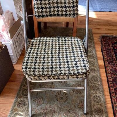 Set of four plaid folding chairs $34