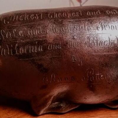 ONE OF THIS SALES HIGHLIGHTS: A very rare, late 1800's ANNA POTTERY stoneware pig flask with inscribed railway map.