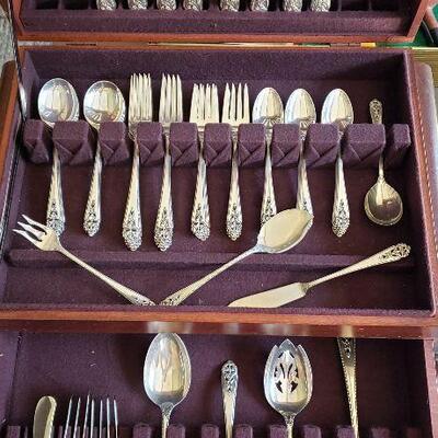 International Sterling Silver (Queens Lace) flatware set with storage box.