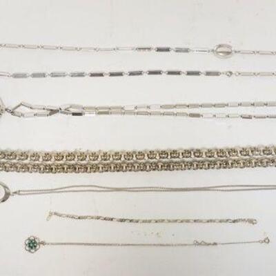 1199	JEWELRY LOT INCLUDING SCRIMSHAW BRACELET AND NECKLACE, STERLING LINK BRACELET AND TURQUOISE NECKLACE
