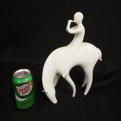 1287	ROYAL DUX MIDCENTURY MODERN FLUTE PLAYER ON HORSE, WHITE PORCELAIN, 9 IN X 12 1/2 IN HIGH
