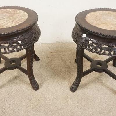 1219	PAIR OF CARVED ASIAN STANDS W/BROWN MARBLE TOPS, 19 IN HIGH X 16.5 IN DIAMETER
