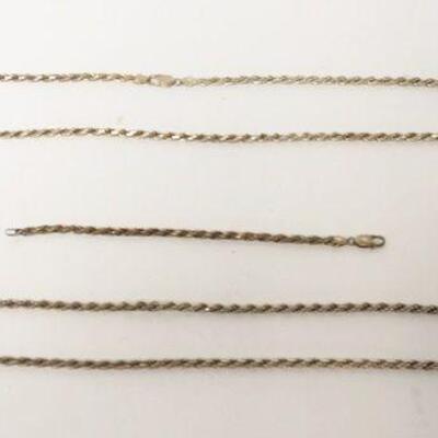 1167	2 STERLING SILVER BRAIDED NECKLACES WITH MATCHING BRACELET, MARKED 925 ITALY, 4.3 TOZ. NECKLACES ARE 28 AND 34 IN LONG, BRACELET IS...