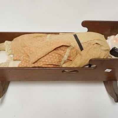 1149	DOLL CRADLE W/DAMAGED DOLL, CRADLE REPAIRED
