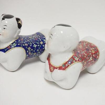 1084	PAIR OF ASIAN PORCELAIN FIGURAL PILLOWS, 8 3/4 IN LONG X 7 IN HIGH
