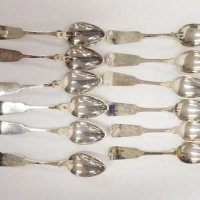 1052	SET OF 12 HAND MADE SILVER TEASPOONS. SIGNED W/HALLMARKS & MONOGRAMMED TIFFANY, 5 3/4 IN LONG, 7.175 TOZ
