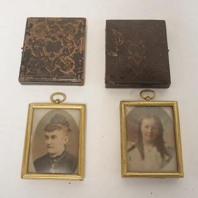 1131	2 CASED IMAGES & 2 FRAMED PHOTOS, CASES ARE 3 IN X 3 1/2 IN
